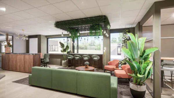 Moderne en sfeervol ingerichte wachtruimte in het kantoor van burgemeester Verderlaan, met groen meubilair en veel planten.